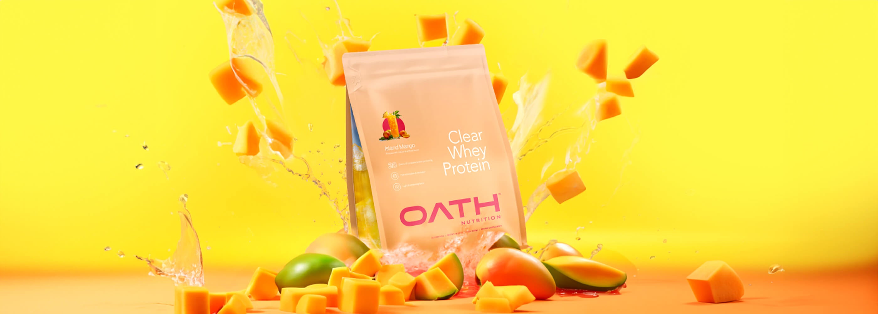 Oath Clear Whey Island Mango bag with mangos bursting all around it